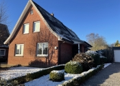 Immobilie Bargteheide - Modern ausgestattetes Einfamilienhaus mit vermieteter Einliegerwohnung in Bargteheide 
(A 2887)