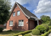 Immobilie Bargteheide - Einfamilienhaus mit vermieteter Einliegerwohnung auf großem Grundstück in Bargteheide (A2887)