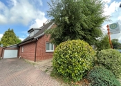 Immobilie Bargteheide - Einfamilienhaus mit vermieteter Einliegerwohnung auf großem Grundstück in Bargteheide (A2887)